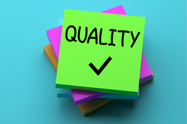 Sticky notes with the word quality